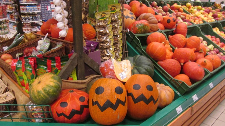 Painted pumpkins at the grocery store.